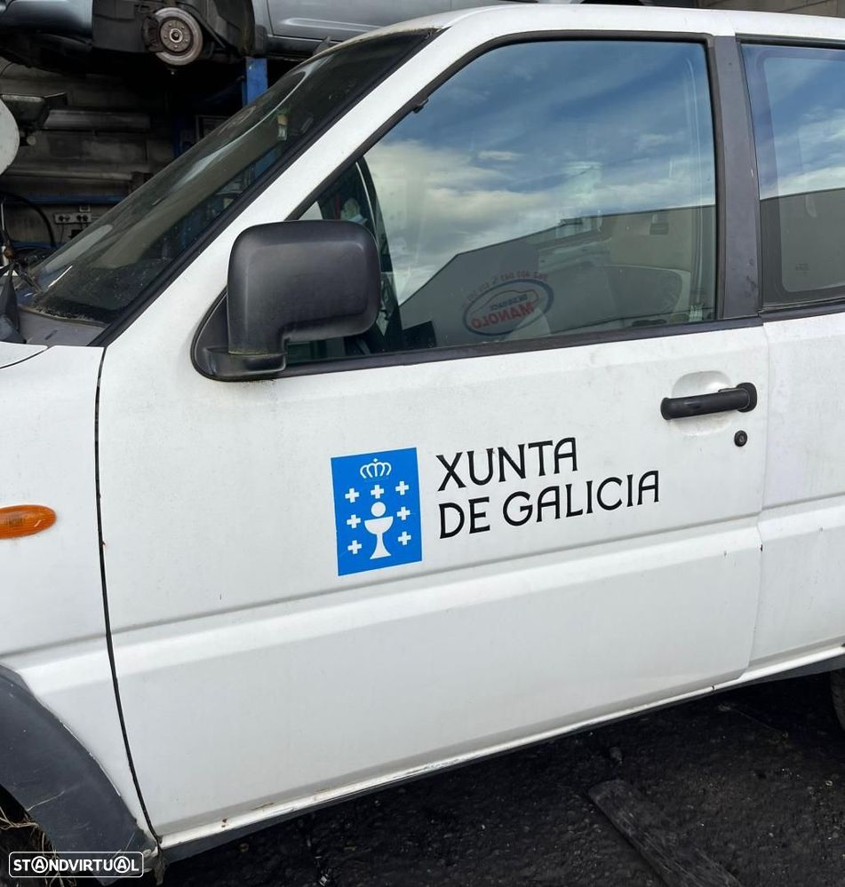PORTA FRENTE ESQUERDA NISSAN TERRANO II R20 - 1