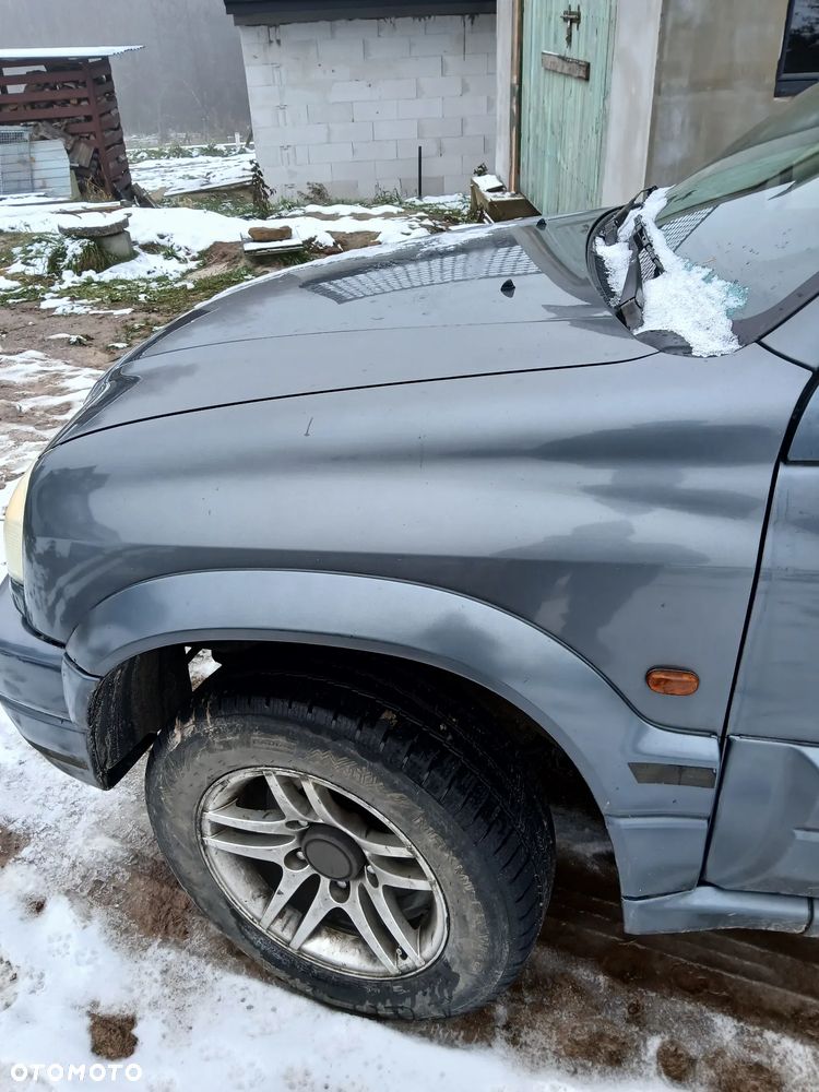 Suzuki Grand Vitara 2.0 - 9