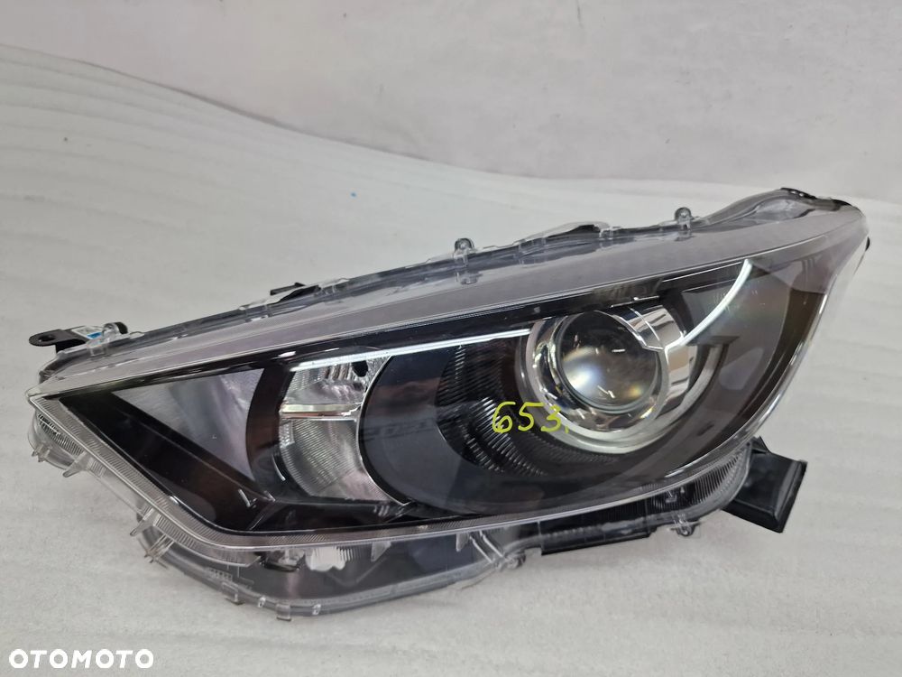 TOYOTA YARIS IV 20- LEWA LAMPA PRZEDNIA PRZÓD SOCZEWKA , NR KOITO K0-6 , NR AUKCJI LA653 - 1
