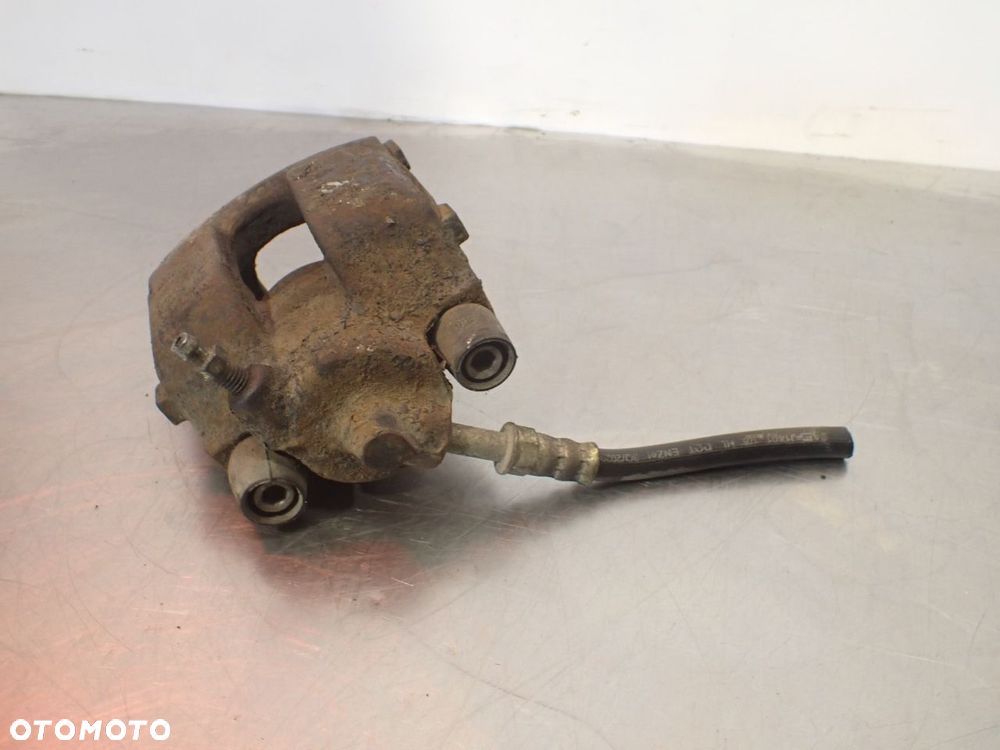 ZACISK HAMULCA PRAWY TYŁ BMW E36 - 3