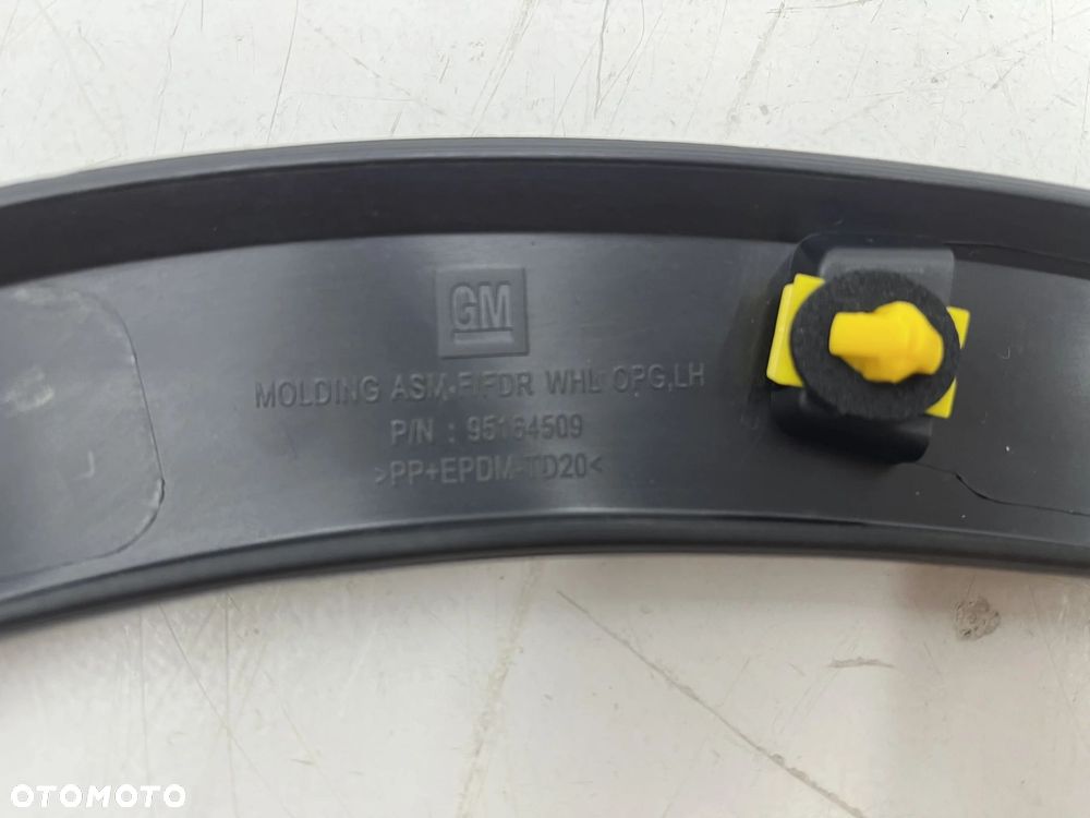 Listwa Opel Mokka A 12-16r. lewy przedni rant nadkola błotnika nakładka lewy przód nowy orginalny 95 - 12