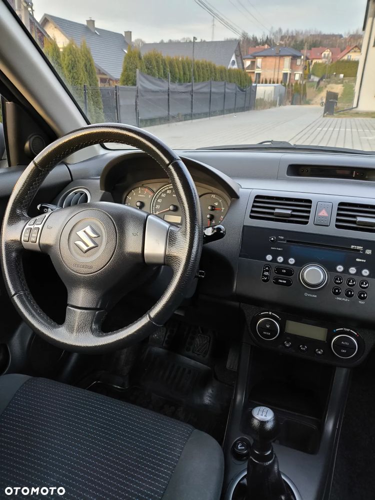 Suzuki Swift 1.3 Club - 7