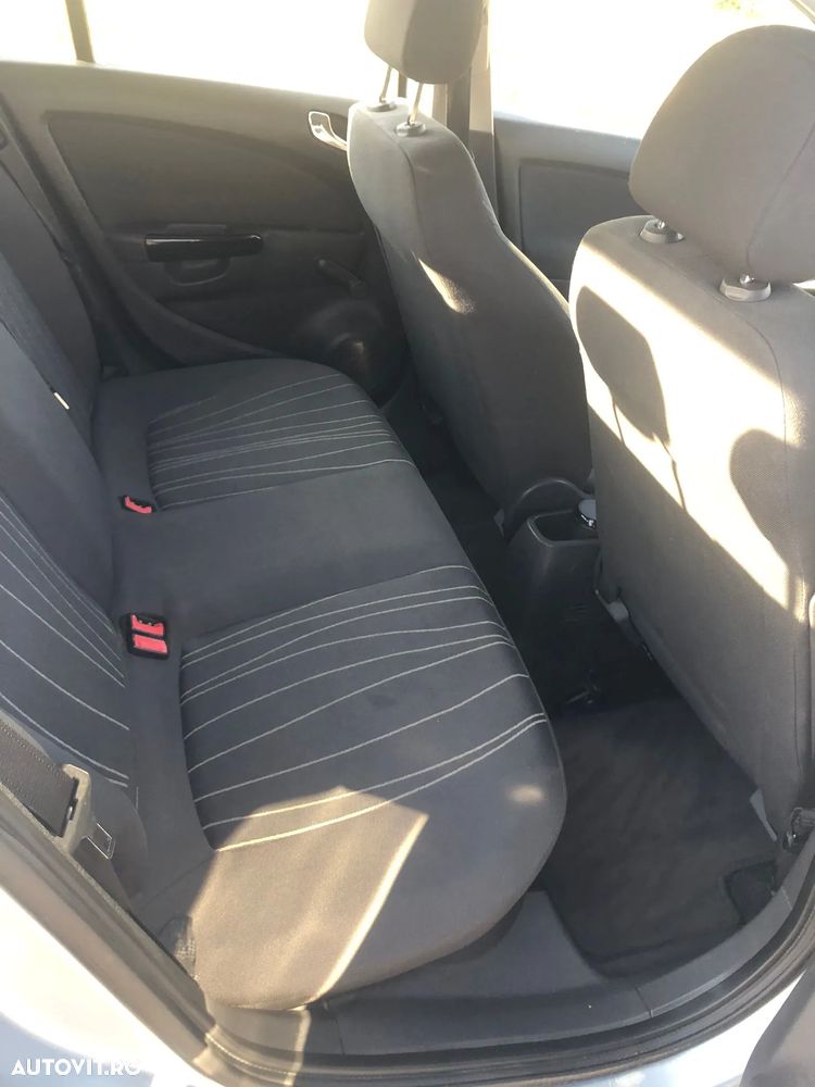 Opel Corsa 1.4i Enjoy - 11
