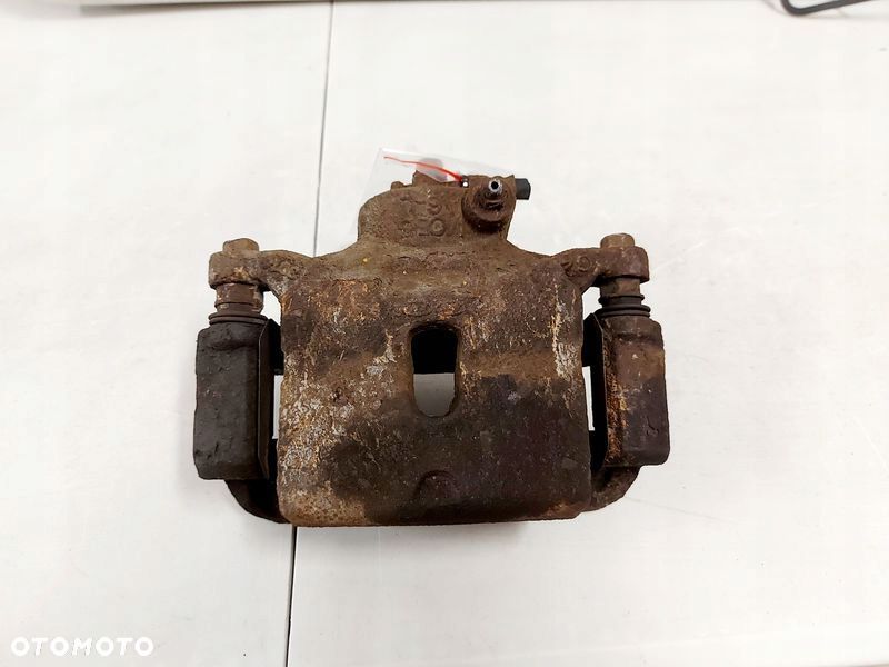 KIA CEED 2 II 1.6 CRDI ZACISK HAMULCOWY LEWY PRZÓD PRZEDNI JARZMO - 1