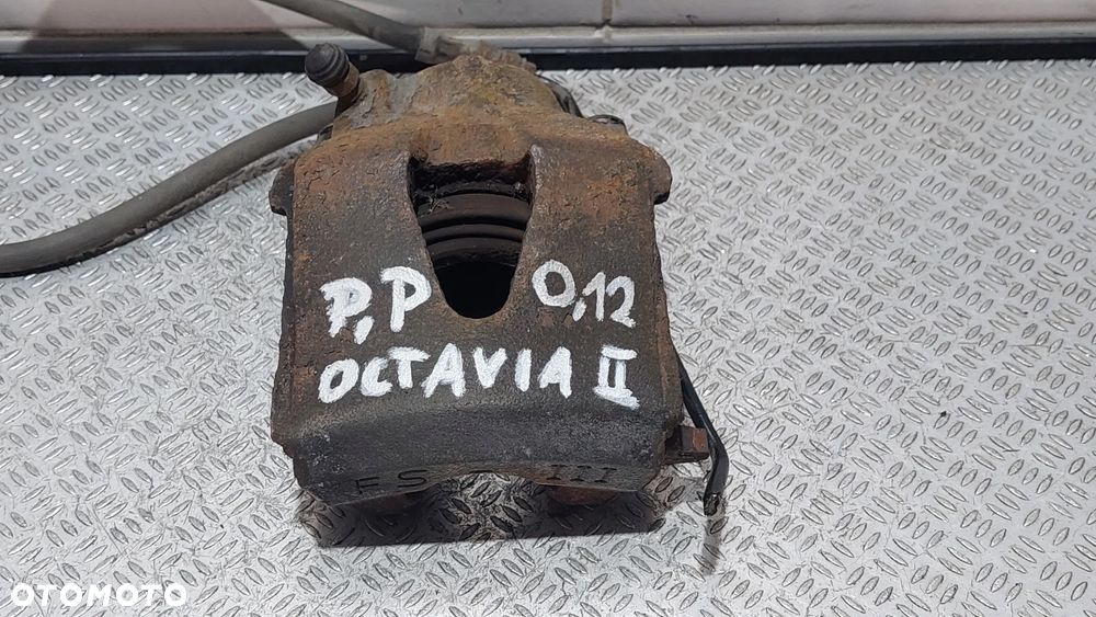ZACISK HAMULCOWY PRAWY PRZÓD SKODA OCTAVIA 2 II LIFT 1,6 TDI R2012 - 1