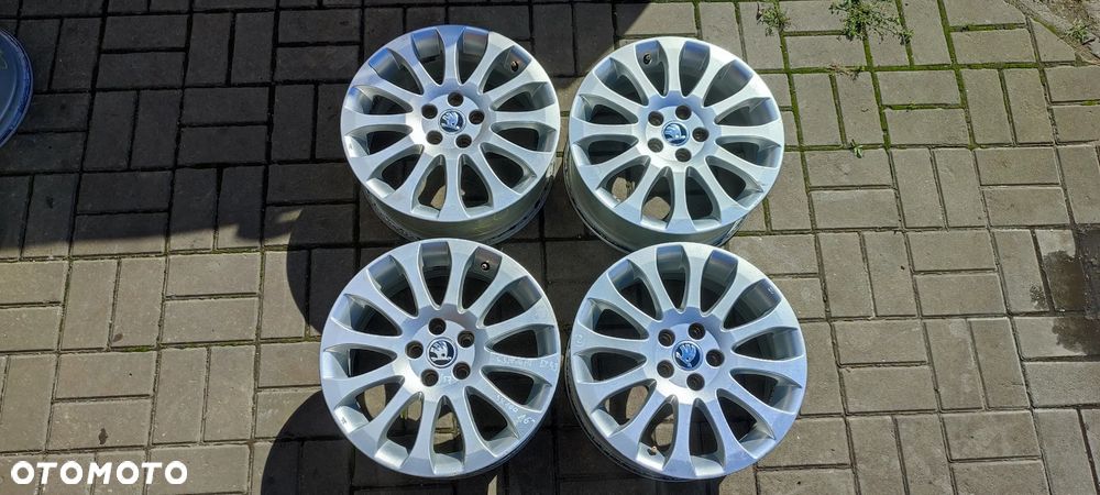 FELGI ALUMNIOWE 5x100 6.5Jx16 CALI ET 43 fi 57.1 5J0601025L SKODA FABIA ROOMSTER RAPID KOMPLET 4 SZTUKI - 1
