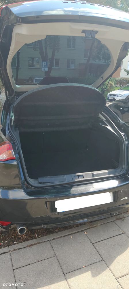 Renault Laguna 2.0 dCi GT ESM - 11
