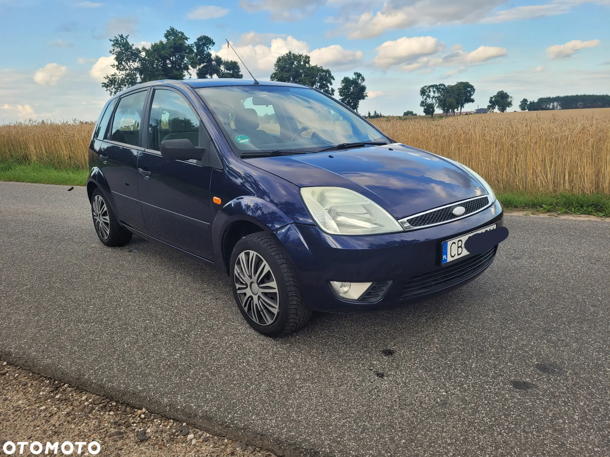 Ford Fiesta 1.4 Ghia - 26