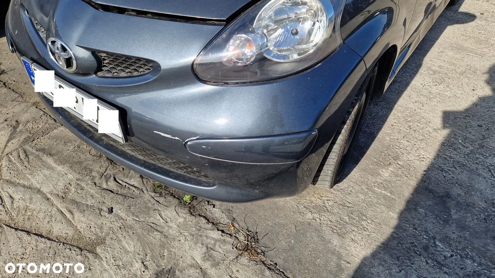 TOYOTA AYGO 05-14 ZDERZAK PRZÓD 1E0 - 2