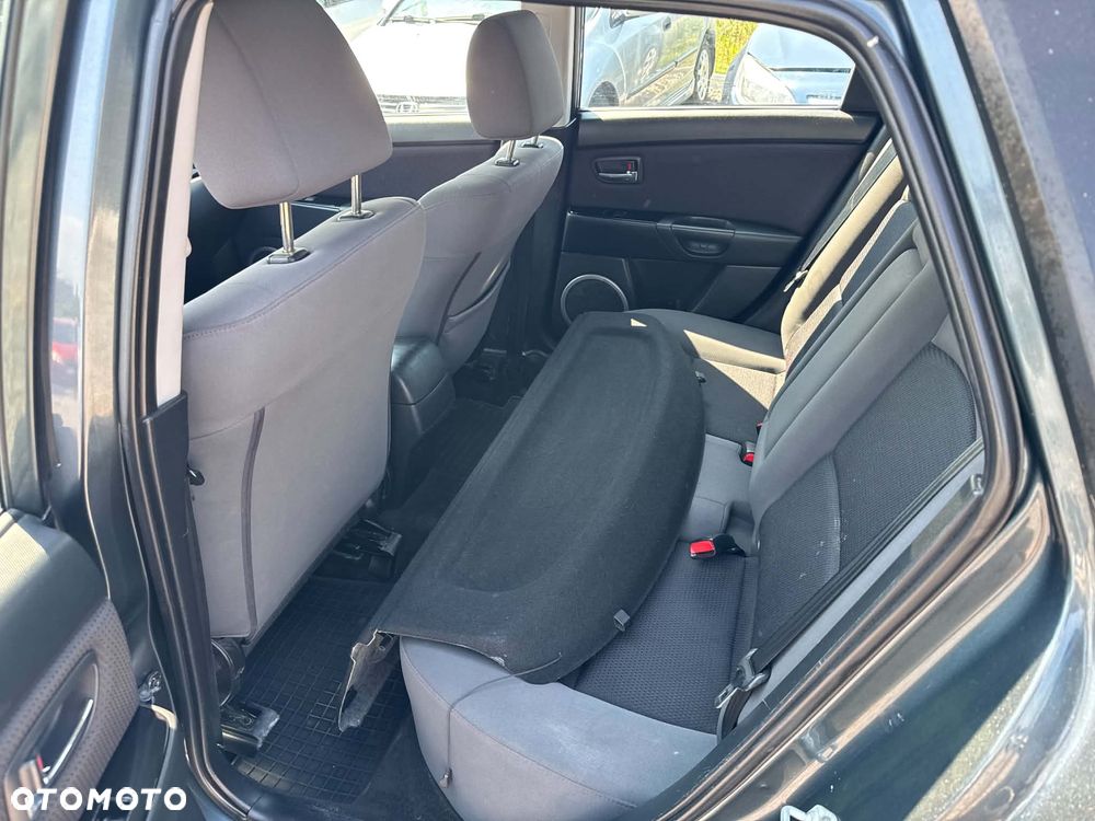 Mazda 3 1.6 Exclusive + - 15