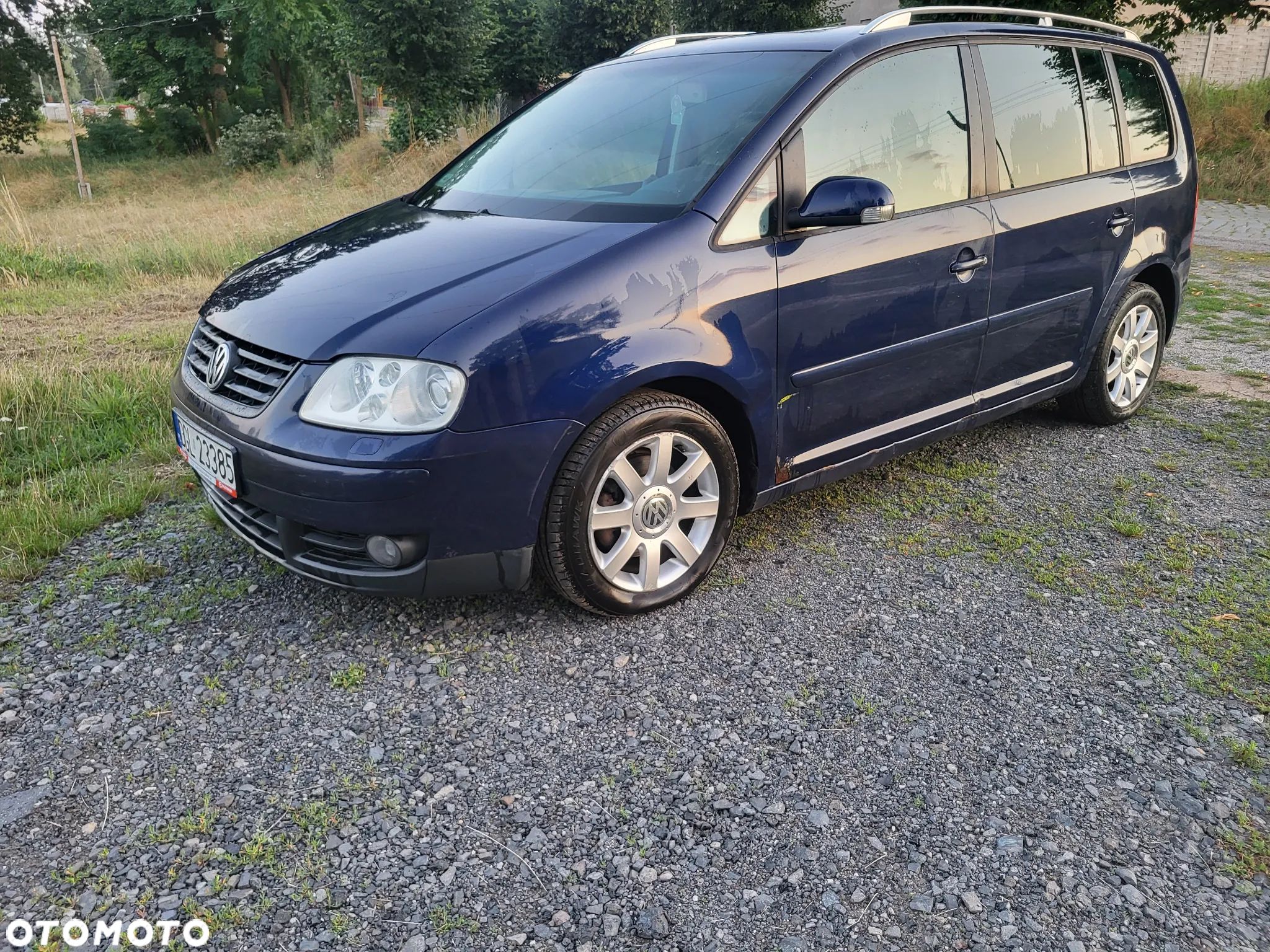 Volkswagen Touran 1.9 TDI DSG Highline - 1