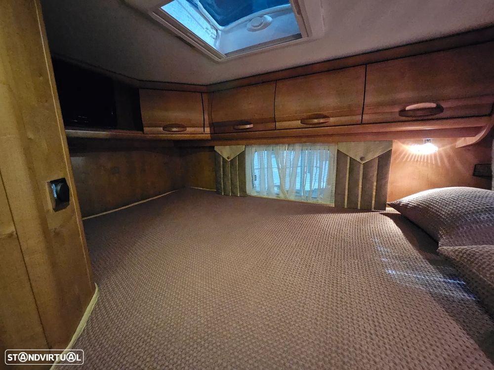 Rapido Le Randonneur 9083DF CHASSI AL-KO CAMA TRANSVERSAL + BASCULANTE - 30