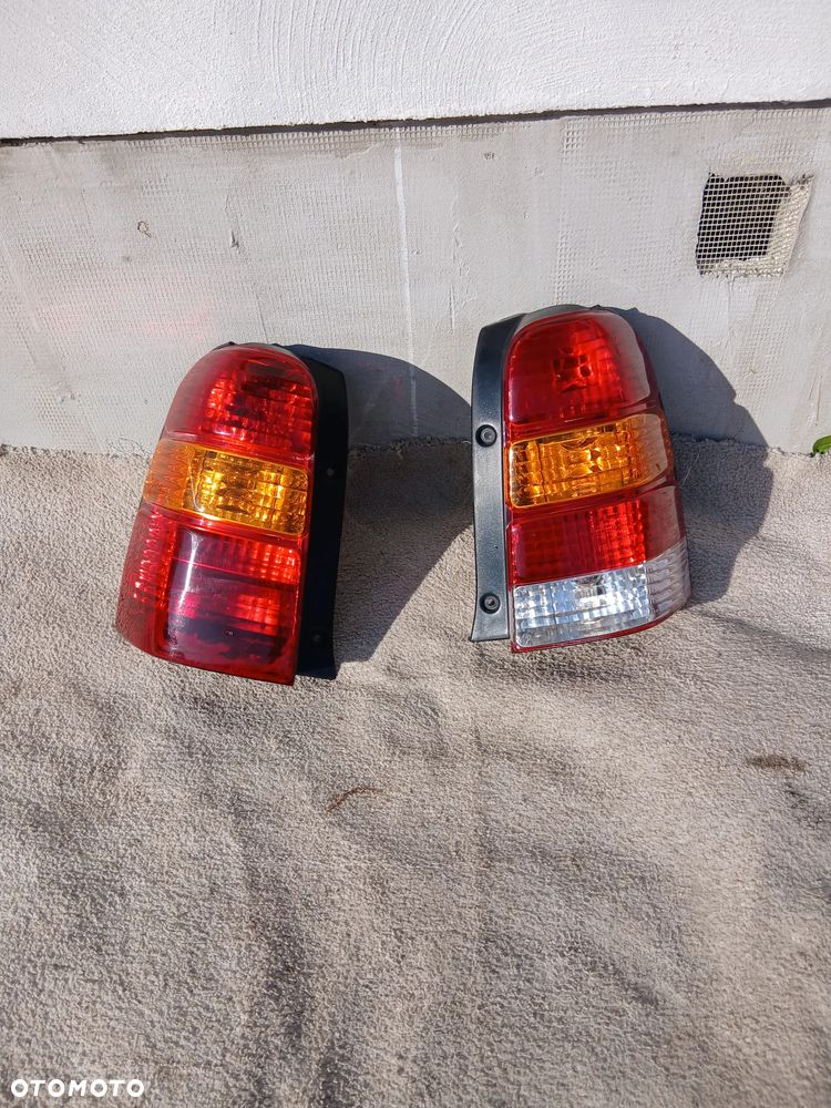 LAMPA TYLNA LEWA I PRAWA FORD MAVERICK EUROPA