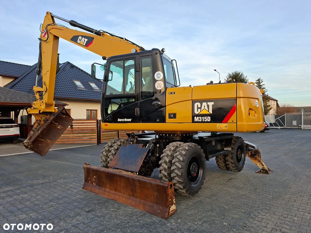 Caterpillar CAT M315D Rok 2011 - 11