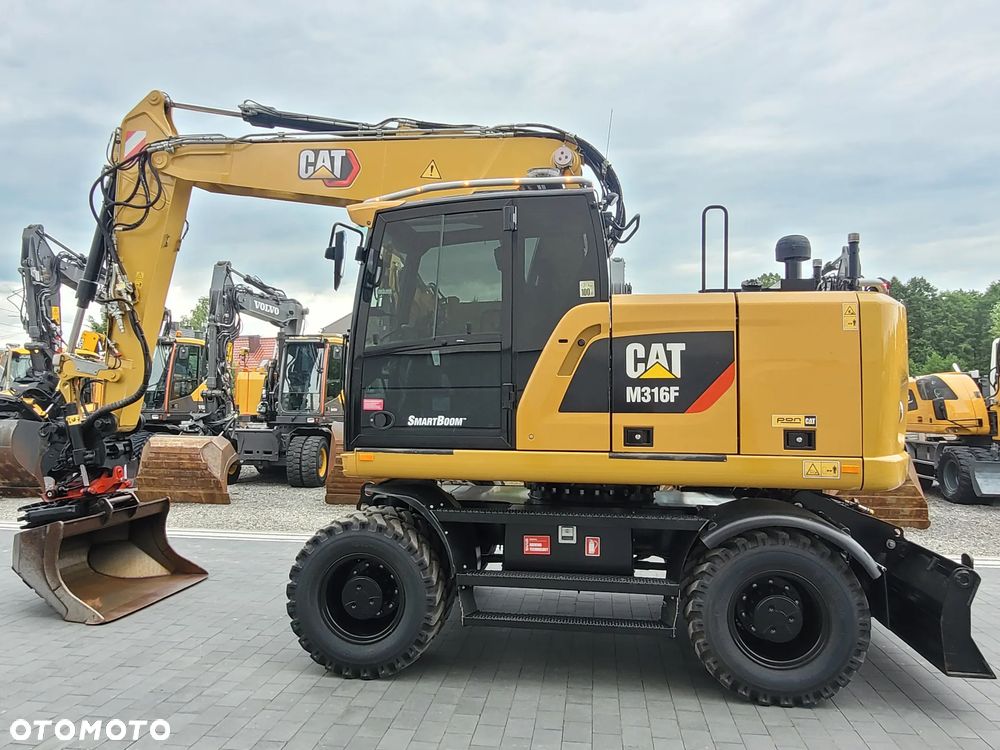 Caterpillar M316F / ROTOTILT ze szczypcami / sprowadzona / - 1