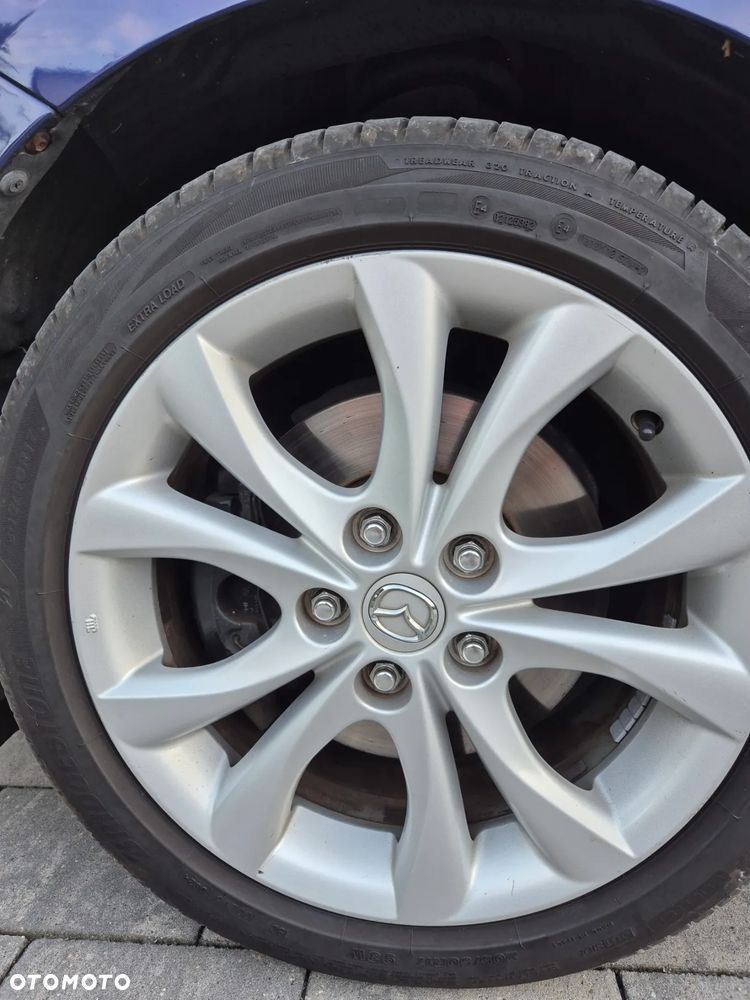 Mazda 3 2.0 Exclusive + - 9