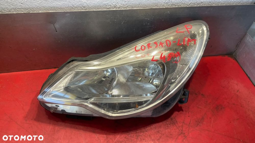 REFLEKTOR LAMPA LEWY OPEL CORSA D LIFT ORYGINAŁ EUROPA - 1