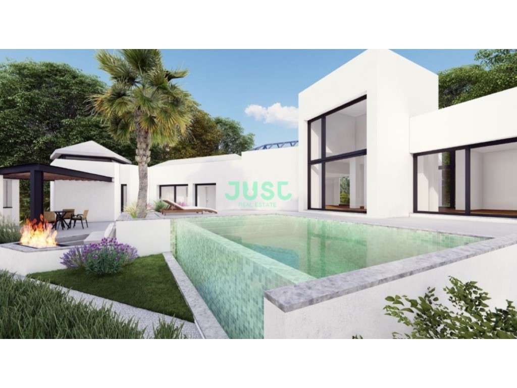Moradia T4, isolada, com piscina e garagem em um lote com mais de 1... - Grande imagem: 2/52