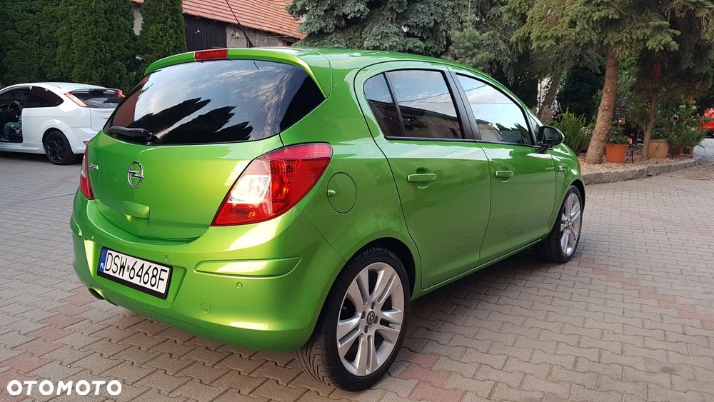 Opel Corsa 1.4 16V Enjoy - 11