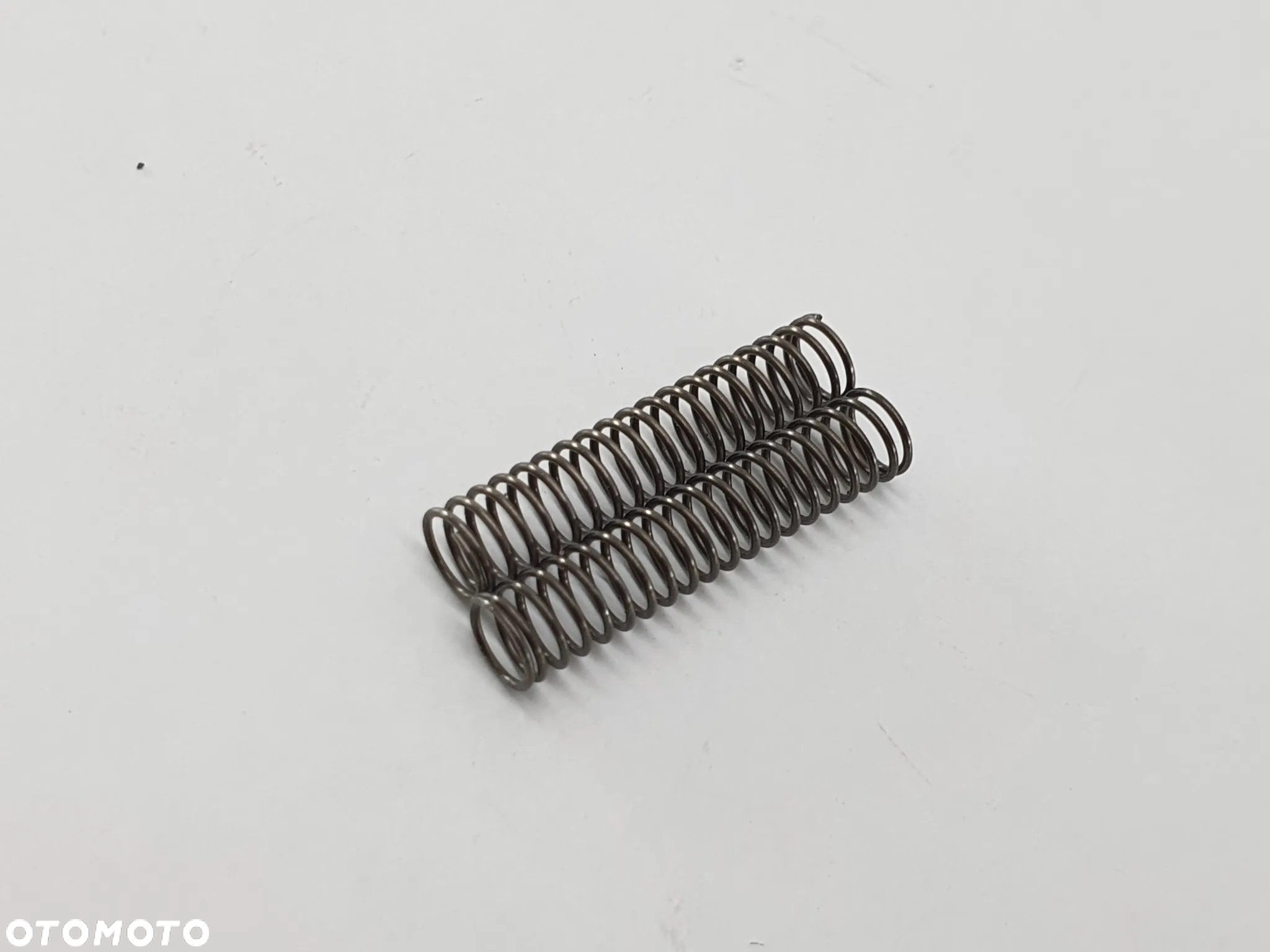 TRYB ZEBATKA OSLONA TULEJKA LOZYSKO SPREZYNA LANCUSZEK  BENELLI 302 - 29