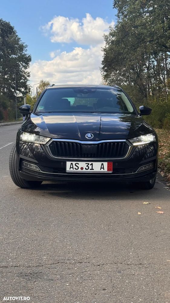 Skoda Octavia Combi 2.0 TDI DSG First Edition - 1