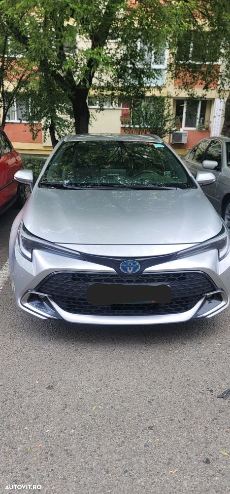 Toyota Corolla 1.8 HSD Exclusive - 1