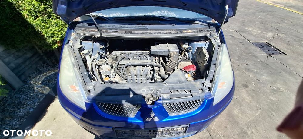 MITSUBISHI COLT Z30 04-08 1.3 16V 4A90 OSŁONA PRZECIWSŁONECZNA LEWA PRAWA - 32