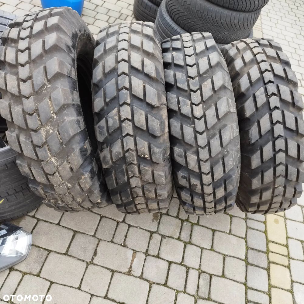 280/85/16 goodyear studded suregrip - 1