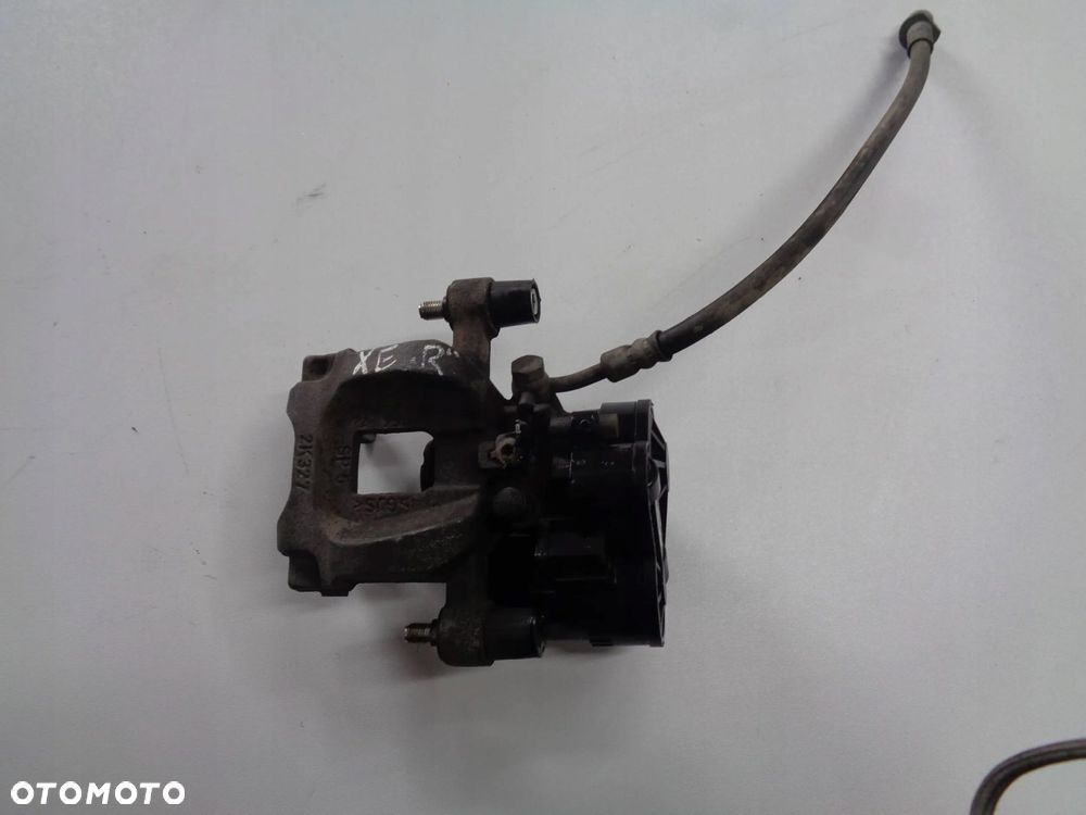 jaguar xe zacisk hamulcowy tył prawy elektryczny. - 1