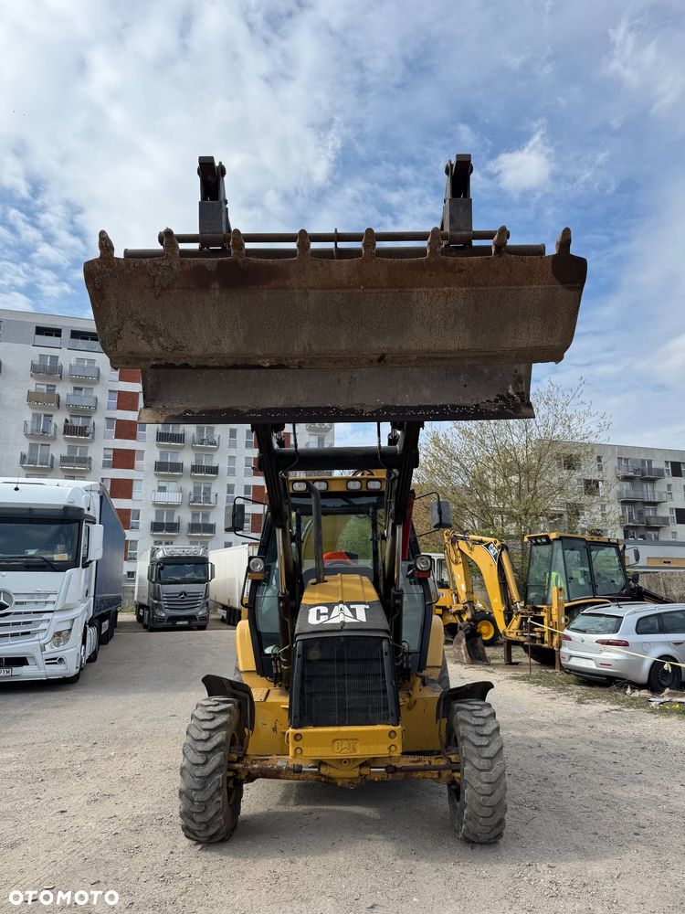 Caterpillar 428D - 11