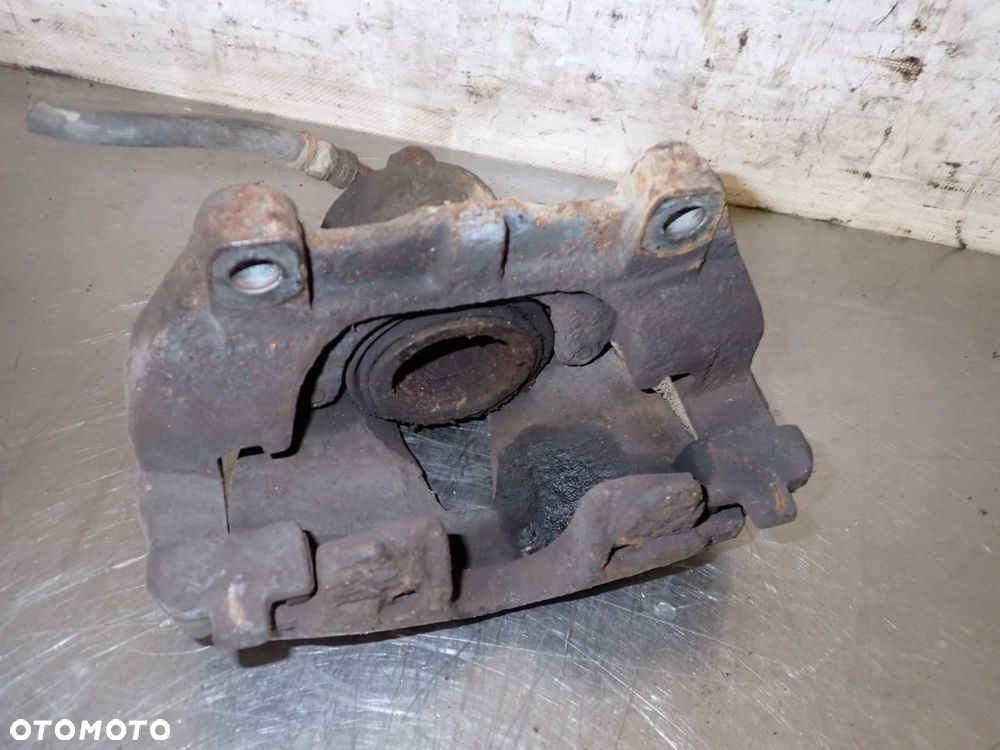 ZACISK HAMULCA LEWY PRZÓD OPEL ZAFIRA B 1.9 - 5