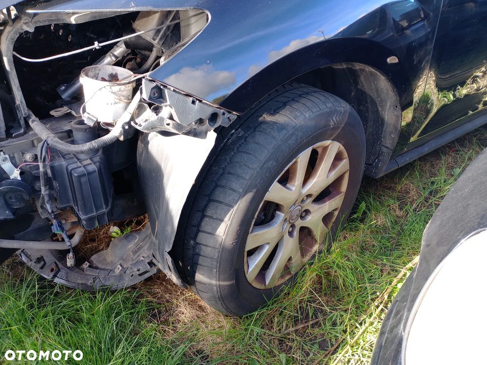 Zderzak tył, klapa Mazda CX7 błotnik, pas, fotele, konsola - 9