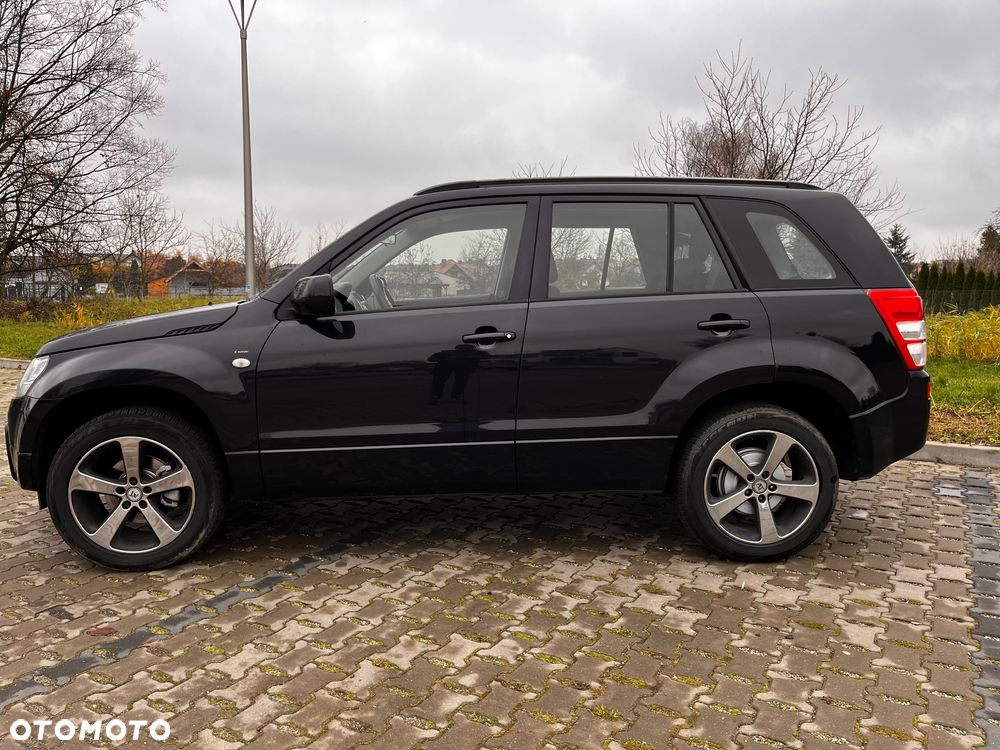 Suzuki Grand Vitara 2.0 - 7