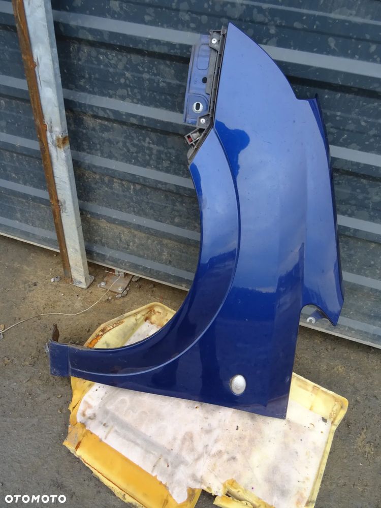 Błotnik Opel Meriva A lewy przód niebieski - 1