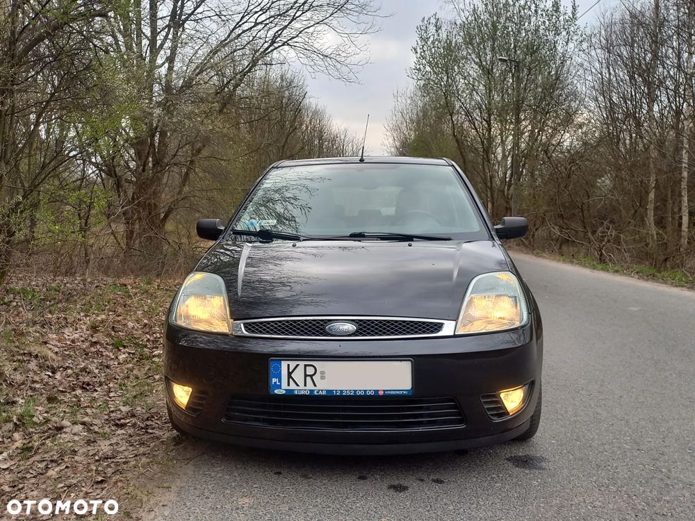 Ford Fiesta 1.4 Ghia - 14