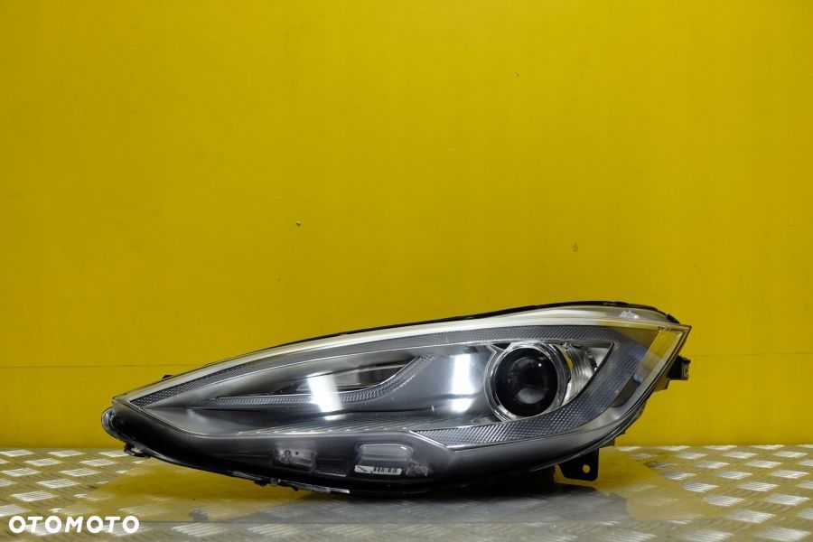 TESLA MODEL S 2012- REFLEKTOR LAMPA XENON LEWA USA - 1