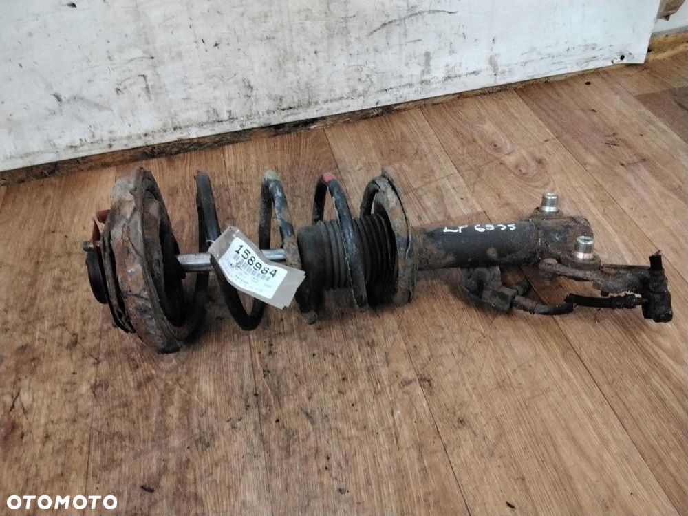 nissan primera p12 mcperson lewy - 1