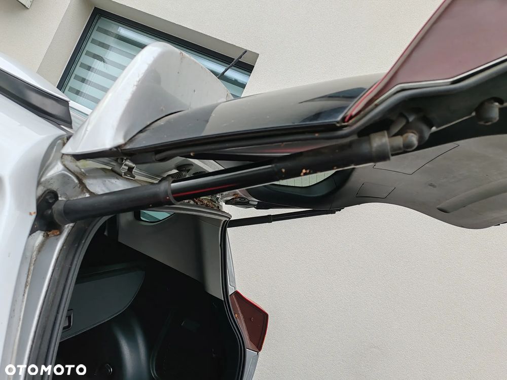 Siłownik elektryczny klapy lewy tył 68920-42016 Toyota RAV-4 RAV4 IV 13-18