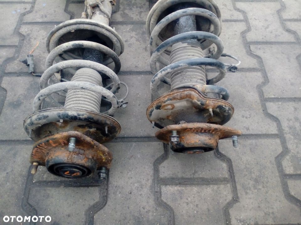 Hyundai Matrix 1,5 CRDI mcpherson przod prawy lewy - 2