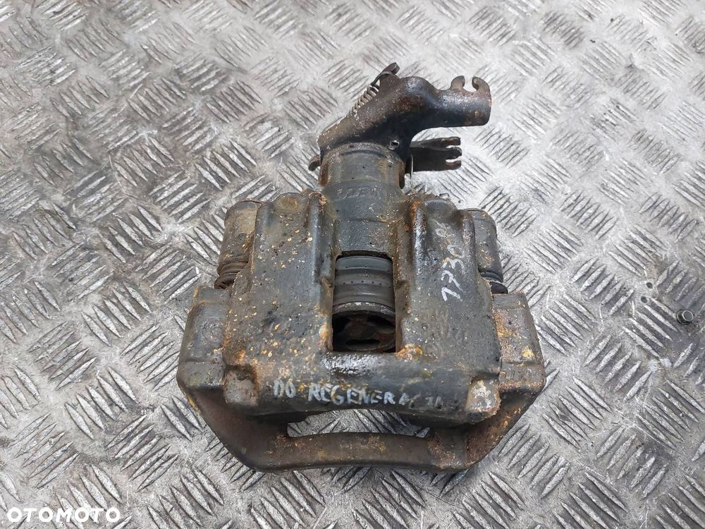 ZACISK HAMULCOWY LEWY TYŁ USZKODZONY DO REGENERACJI IVECO DAILY IV - 2