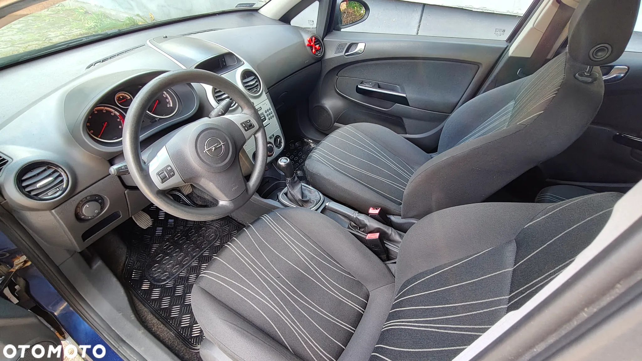Opel Corsa 1.2 16V Enjoy - 10