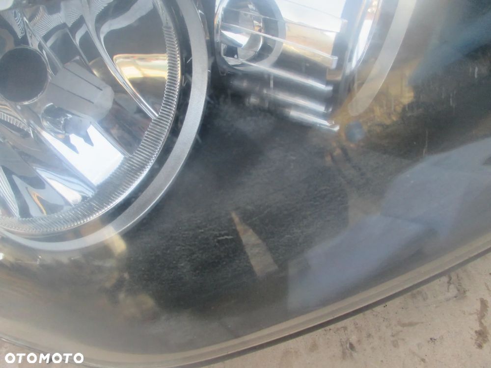 lampa prawa Opel Astra 3 H Hella Europa - 4