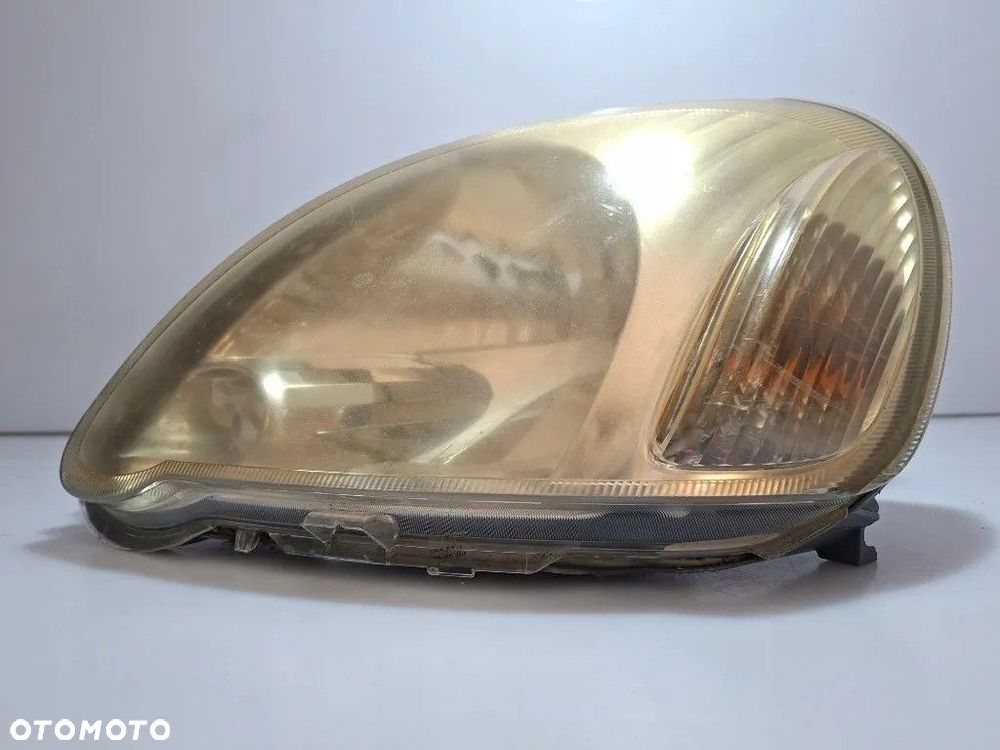TOYOTA YARIS I LAMPA REFLEKTOR LEWY PRZÓD EUROPA 89008658 811700D080 - 3