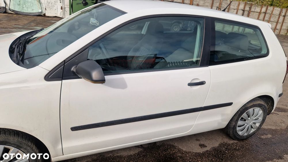 VOLKSWAGEN POLO 9N2 BŁOTNIK LEWY LB9A - 1