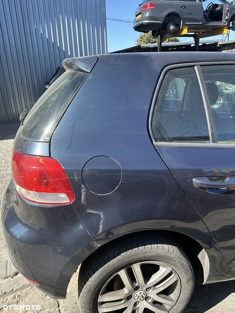 VW GOLF 6 BŁOTNIK TYŁ L/P LC5F