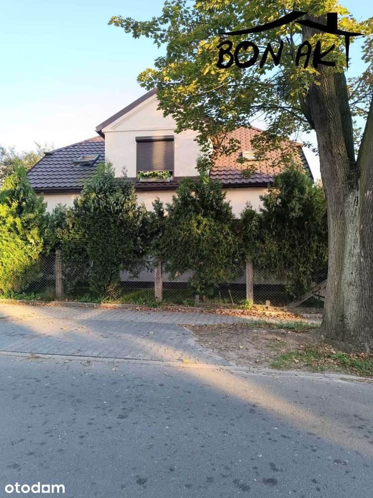 Mieszkanie z ogrodem i garażem