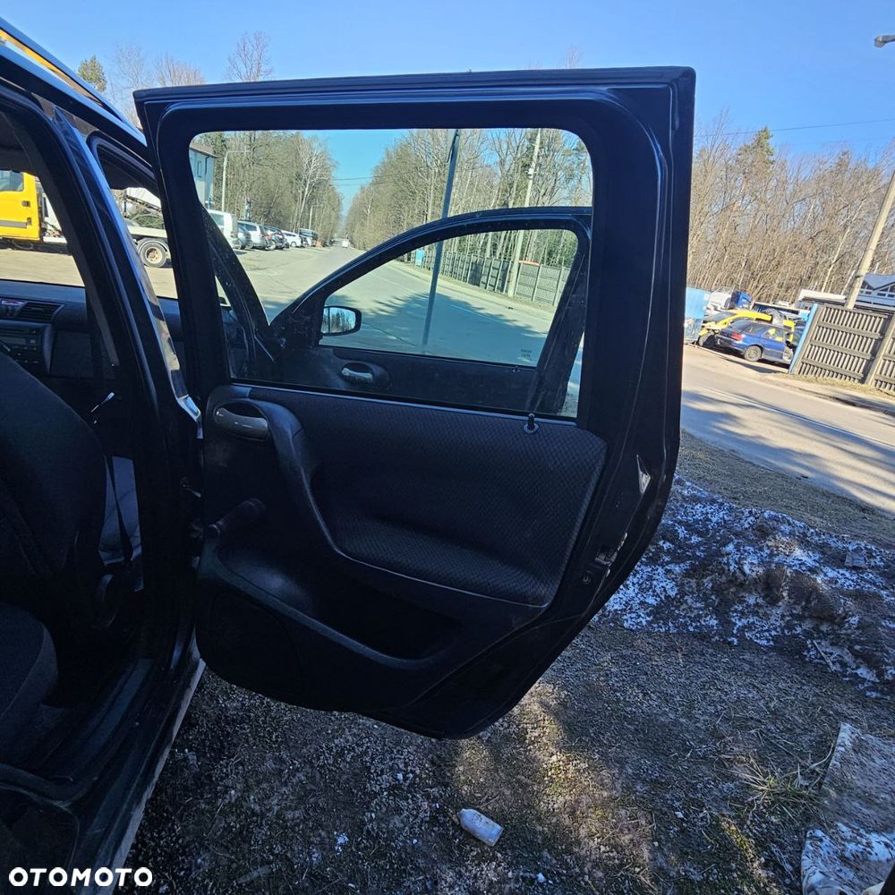 Fiat Stilo 1,6 B 76 kW / 103 KM (2003 kombi) (kod lak: 675) pojazd na części: maska, zderzak, drzwi, szyby, lusterka, chłodnica ... - 4