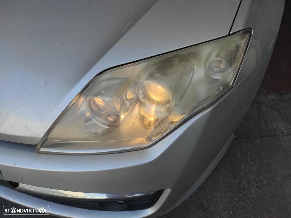 FAROL ESQUERDO RENAULT LAGUNA III GRANDTOUR - 1