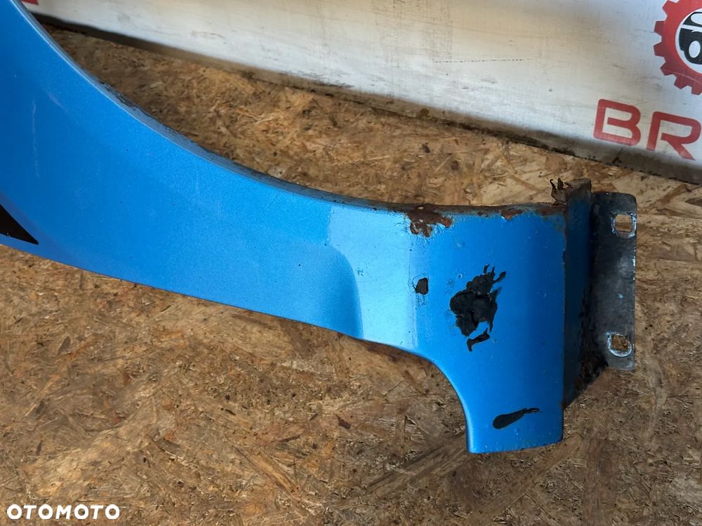 BŁOTNIK PRZEDNI PRAWY FORD FIESTA MK7  99 - 4