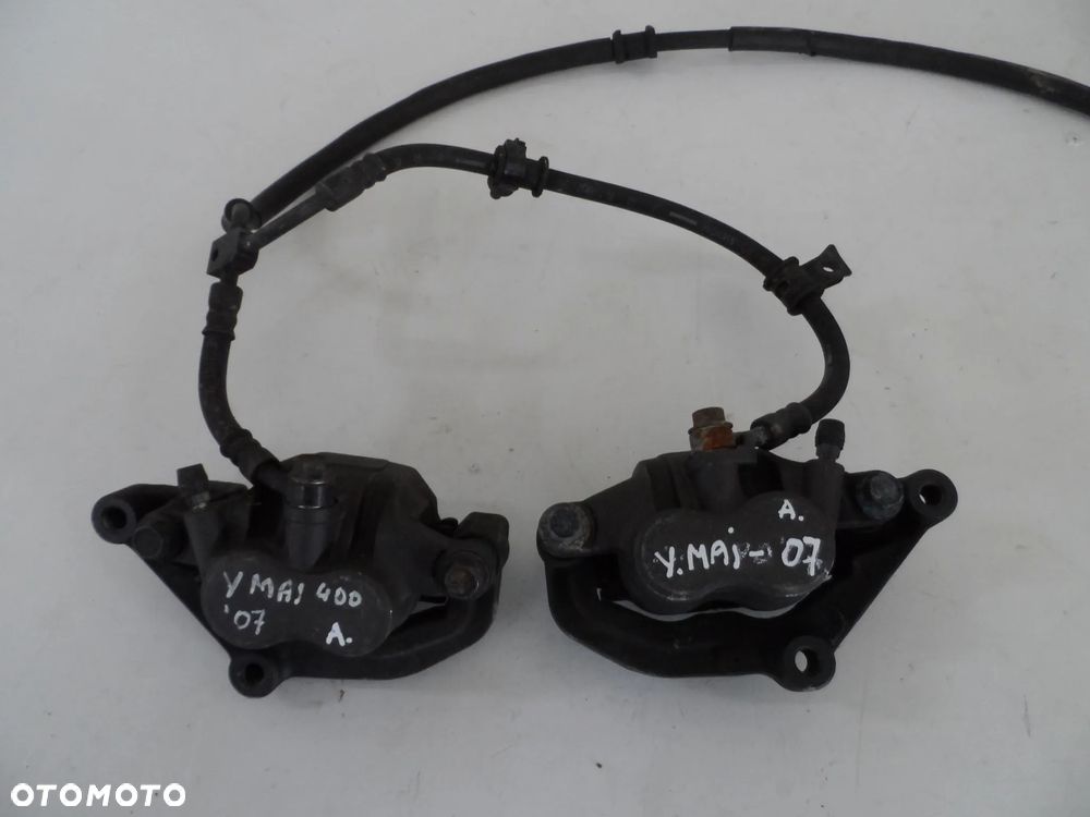 YAMAHA MAJESTY 400 zacisk hamulcowy przód P, L - 1